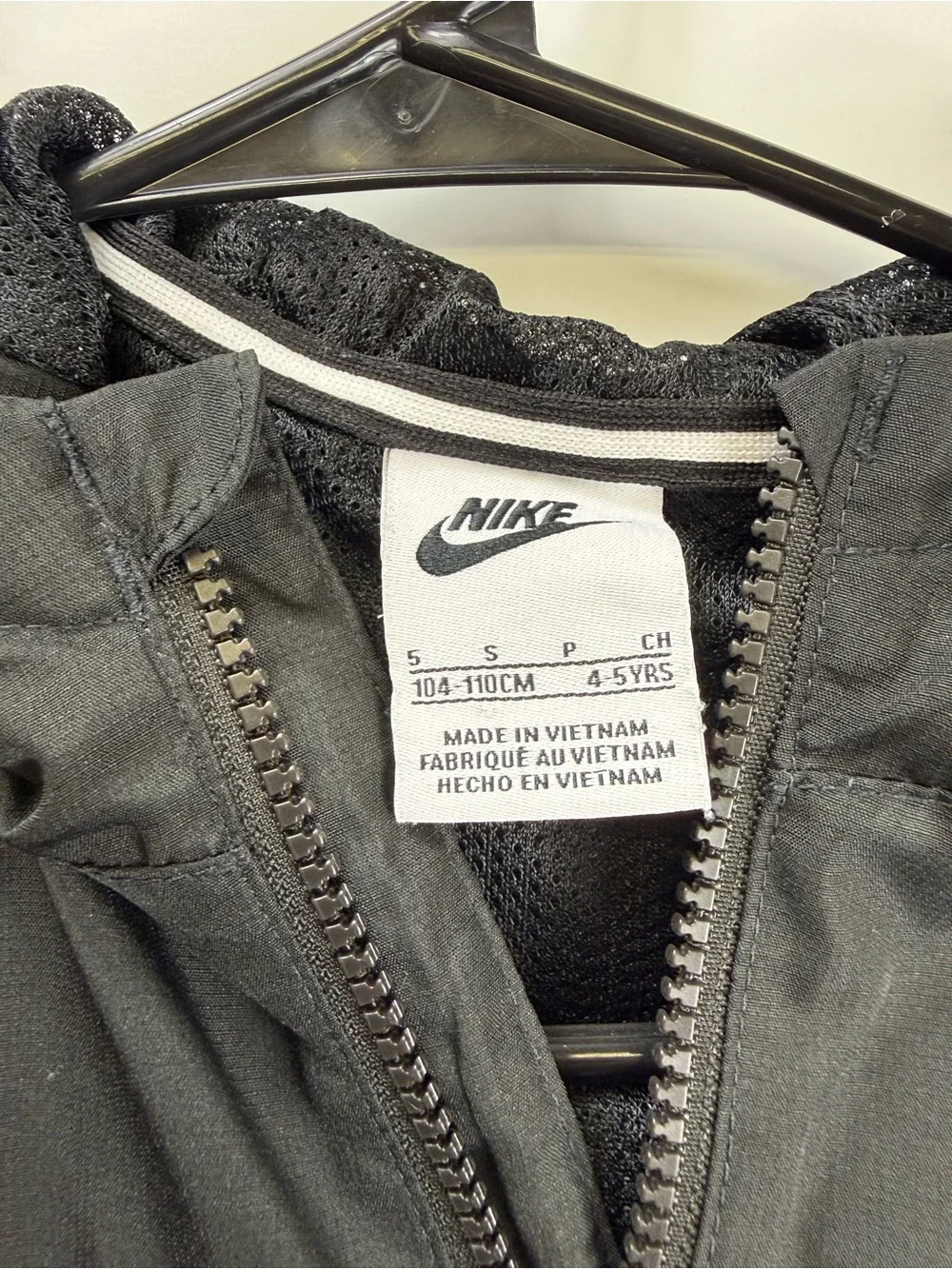 Nike Kids Black Hooded Rain Jacket with White Logo